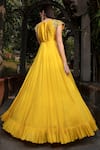 Shop_Keerthi Kadire_Yellow Raw Silk Boat Flared Gown _at_Aza_Fashions