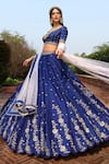 Buy_Keerthi Kadire_Blue Raw Silk Scoop Neck Embroidered Bridal Lehenga Set _at_Aza_Fashions