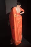 Shop_Kapardara_Orange Pure Silk Organza Hand Painted Sun Motif Saree _at_Aza_Fashions