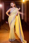 Buy_SAKSHAM & NEHARICKA_Yellow Georgette Embroidered Sequin Saree With Unstitched Blouse Piece _at_Aza_Fashions