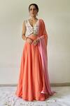 Buy_Kanika Sharma_Peach Tussar Cotton Embroidered Blouse And Lehenga Set_at_Aza_Fashions