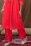 Buy_Label Kinjal Modi_Peach Cotton Silk Bandhani V Neck Pintucked Tunic And Pant Set _Online_at_Aza_Fashions
