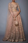 RI.Ritu Kumar_Pink Net V-shaped Neckline Embroidered Bridal Lehenga Set _Online_at_Aza_Fashions