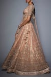 Shop_RI.Ritu Kumar_Pink Net V-shaped Neckline Embroidered Bridal Lehenga Set _Online_at_Aza_Fashions