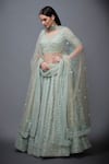 Buy RI.Ritu Kumar Blue Net Leaf Neck Embellished Bridal Lehenga Set Online at Aza Fashions Buy_RI.Ritu Kumar_Blue Net Leaf Neck Embellished Bridal Lehenga Set _Online_at_Aza_Fashions