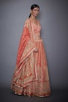 RI.Ritu Kumar_Coral Satin Embroidery V Neck Blouse Lehenga Set _Online_at_Aza_Fashions