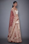 Buy_RI.Ritu Kumar_Red Satin Leaf Neck Embroidered Lehenga Set _at_Aza_Fashions