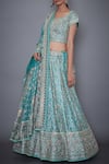 RI.Ritu Kumar_Blue Silk Satin Sweetheart Neck Bridal Lehenga Set _Online_at_Aza_Fashions