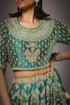 Shop_RI.Ritu Kumar_Green Silk Satin Round Embroidered Bridal Lehenga Set _Online_at_Aza_Fashions