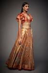 RI.Ritu Kumar Orange Shikarga Brocade V Neck Jamawar Lehenga Set Online at Aza Fashions RI.Ritu Kumar_Orange Shikarga Brocade V Neck Jamawar Lehenga Set _Online_at_Aza_Fashions