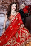 Shop Archana Kochhar Red Raw Silk, Net Dori, Gota, Resham V Swastik Embroidered Bridal Lehenga Set at Aza Fashions Shop_Archana Kochhar_Red Raw Silk, Net Dori, Gota, Resham V Swastik Embroidered Bridal Lehenga Set _at_Aza_Fashions
