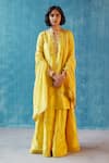 Label Earthen_Yellow Handwoven Banarasi Butti Silk Embroidery Round Kurta Set  _Online_at_Aza_Fashions