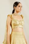 Shop_Adaara Couture_Gold Raw Silk Sweetheart Neck Embellished Bridal Lehenga Set _Online_at_Aza_Fashions