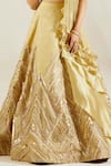 Adaara Couture_Gold Raw Silk Sweetheart Neck Embellished Bridal Lehenga Set _at_Aza_Fashions