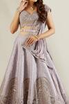 Adaara Couture Purple Raw Silk, Net, Georgette Sweetheart Neck Embellished Bridal Lehenga Set at Aza Fashions Adaara Couture_Purple Raw Silk, Net, Georgette Sweetheart Neck Embellished Bridal Lehenga Set _at_Aza_Fashions