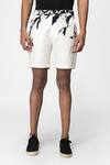Shop Genes Lecoanet Hemant White Stretch H. Bone Bamboo Leaves Leaf Print Shorts Online at Aza Fashions Shop_Genes Lecoanet Hemant_White Stretch H. Bone Bamboo Leaves Leaf Print Shorts_Online_at_Aza_Fashions