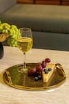 Logam_Gold Mild Steel And Mdf Zahra Circular Shape Tray _Online_at_Aza_Fashions