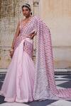 Shop_Bindani by Jigar & Nikita_Pink Net Linear Embroidered Blouse And Lehenga Set_at_Aza_Fashions