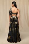 Shop_Masaba_Black Crepe Printed Wallflower Asymmetric Draped Bustier And Lehenga Set _at_Aza_Fashions