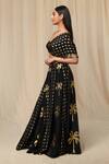 Buy_Masaba_Black Crepe Printed Wallflower Asymmetric Draped Bustier And Lehenga Set _Online_at_Aza_Fashions