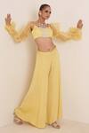 Buy_Merge Design_Yellow Lining Crepe, Sleeves Organza, Top And Pant Embroidered Flared Set _at_Aza_Fashions