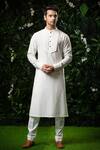 Buy_Mirroir_White Cotton Silk, Poly Blend, Suiting Asymmetric Bundi And Kurta Set _at_Aza_Fashions