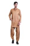 Buy_SAKSHAM & NEHARICKA_Brown Cotton Suitings Plain Kurta And Pant Set  _at_Aza_Fashions