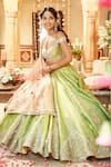 Buy Matsya Green Silk Dori, Zardozi And Mirror Work One The Iconic Winged Temple Lehenga Set at Aza Fashions Buy_Matsya_Green Silk Dori, Zardozi And Mirror Work One The Iconic Winged Temple Lehenga Set _at_Aza_Fashions