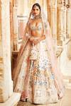 Buy Matsya Ivory Silk Dori, Swarovski, The Pichwai Bagh Embroidered Bridal Lehenga Set at Aza Fashions Buy_Matsya_Ivory Silk Dori, Swarovski, The Pichwai Bagh Embroidered Bridal Lehenga Set _at_Aza_Fashions