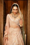 Shop Matsya Beige Silk Resham, Aari, Kasab The Royal Pichwai Embroidered Bridal Lehenga Set at Aza Fashions Shop_Matsya_Beige Silk Resham, Aari, Kasab The Royal Pichwai Embroidered Bridal Lehenga Set _at_Aza_Fashions