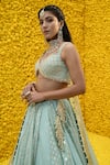 Mahima Mahajan_Blue Banarasi Chanderi Woven Floral V Neck Aashna Bridal Lehenga Set_at_Aza_Fashions