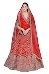 Mrunalini Rao_Red Raw Silk V Neck Zardozi Bridal Lehenga Set _Online_at_Aza_Fashions