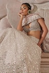 Buy_Mrunalini Rao_Peach Raw Silk Taara Bloom Embroidered Lehenga Set_Online_at_Aza_Fashions