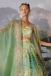 Mrunalini Rao_Green Raw Silk Embroidered Cape And Skirt Set_Online_at_Aza_Fashions