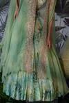 Mrunalini Rao_Green Raw Silk Embroidered Cape And Skirt Set_at_Aza_Fashions