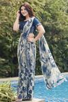 Buy Mishru Blue Georgette Printed Pant Saree With Blouse at Aza Fashions Buy_Mishru_Blue Georgette Printed Pant Saree With Blouse_at_Aza_Fashions