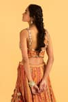 Shop_Saundh_Orange Raw Silk Embroidered Cape Lehenga Set_at_Aza_Fashions