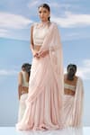 Buy_Mandira Wirk_Peach Organza Round Pre-draped Lehenga Saree _at_Aza_Fashions