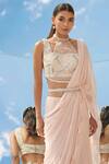 Buy_Mandira Wirk_Peach Organza Round Pre-draped Lehenga Saree _Online_at_Aza_Fashions