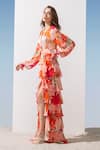 Mandira Wirk_Coral Chiffon Printed Pattern Plunge V Neck Tiered Dress _Online_at_Aza_Fashions