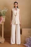 Buy_Nayantara Couture_Beige Nylon Shawl Lapel Embroidered Blazer And Pant Set _at_Aza_Fashions