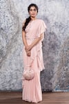 Buy_Nayantaara_Pink Raw Silk Round Ruffle Saree With Embroidered Blouse _at_Aza_Fashions