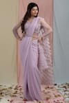 Buy_Nayantaara_Purple Swiss Net Embroidery V Neck Ruffle Saree With Blouse _at_Aza_Fashions