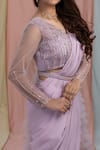 Nayantaara_Purple Swiss Net Embroidery V Neck Ruffle Saree With Blouse _at_Aza_Fashions