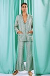 Shop_Label Ne'chi_Blue Muslin Silk Printed Floral V Neck Blazer And Pant Set _at_Aza_Fashions