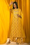 Shop_Label Ne'chi_Yellow Muslin Silk Printed Floral Round Kurta Set  _at_Aza_Fashions