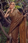Shop_Nitya Bajaj_Gold Georgette Sequin Embroidered Saree With Blouse_Online_at_Aza_Fashions