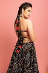 Shop_Nitara Dhanraj Label_Black Raw Silk Embroidered Thread Work Halter Neck Mirror Lehenga And Choli Set _at_Aza_Fashions