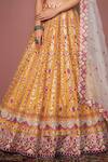 Shop_Tamanna Punjabi Kapoor_Orange Chanderi, Organza Lining Crepe Halter Bridal Lehenga Set _Online_at_Aza_Fashions