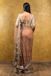 Shop_Nitika Gujral_Beige Net Embroidery V Neck Saree With Blouse _at_Aza_Fashions